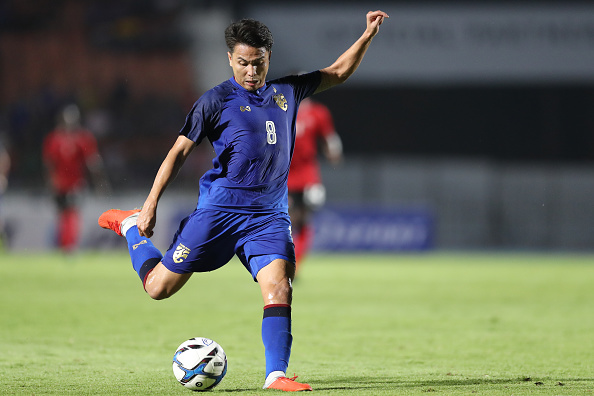 SUPHAN BURI, THAILAND - OCTOBER 14: Thitiphan Puangjan #8 of Thailand in action during the international friendly match between Thailand and Trinidad and Tobago at Suphanburi Stadium on October 14, 2018 in Suphan Buri, Thailand. (Photo by Pakawich Damrongkiattisak/Getty Images)